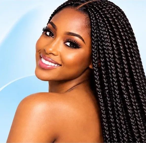 Smiling woman with long box braids